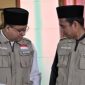 SUMRINGAH: Momen Anies Baswedan saat mendapatkan pernyataan dukungan dari ulama kondang Ustadz Abdul Somad (UAS) saat mengisi ceramah di Riau. (ist/TELITI.ID) 